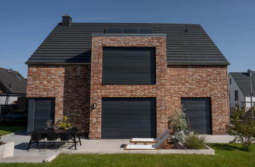 Neubau eines Einfamilienhauses mit Klinkerfassade in Bielefeld durch Compact Bau GmbH